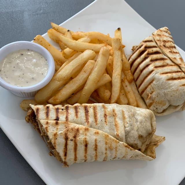 Chicken Shawarma Sandwich with Fries.